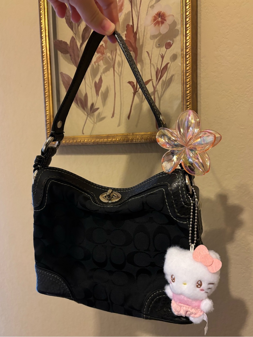 Coach Black Signature Chelsea Shoulder Bag With a Turnlock Closure